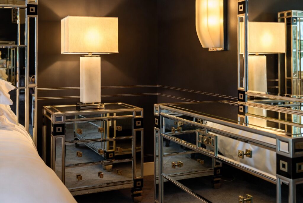 Use Mirrored Nightstands or Dressers